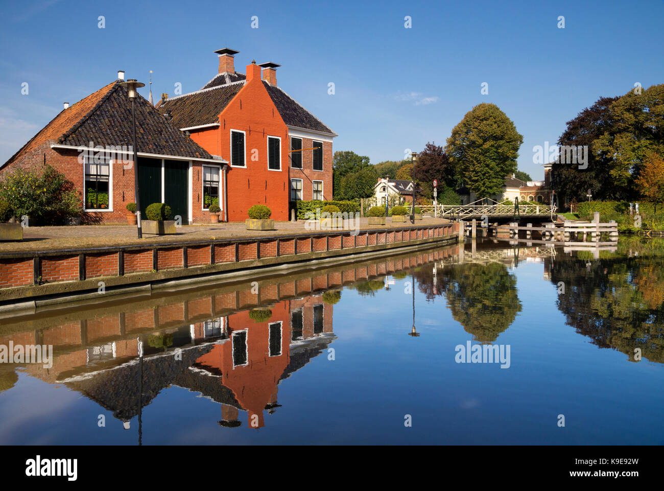 The village Onderdendam on the Boterdiep canal in the Dutch province Groningen Stock Photo