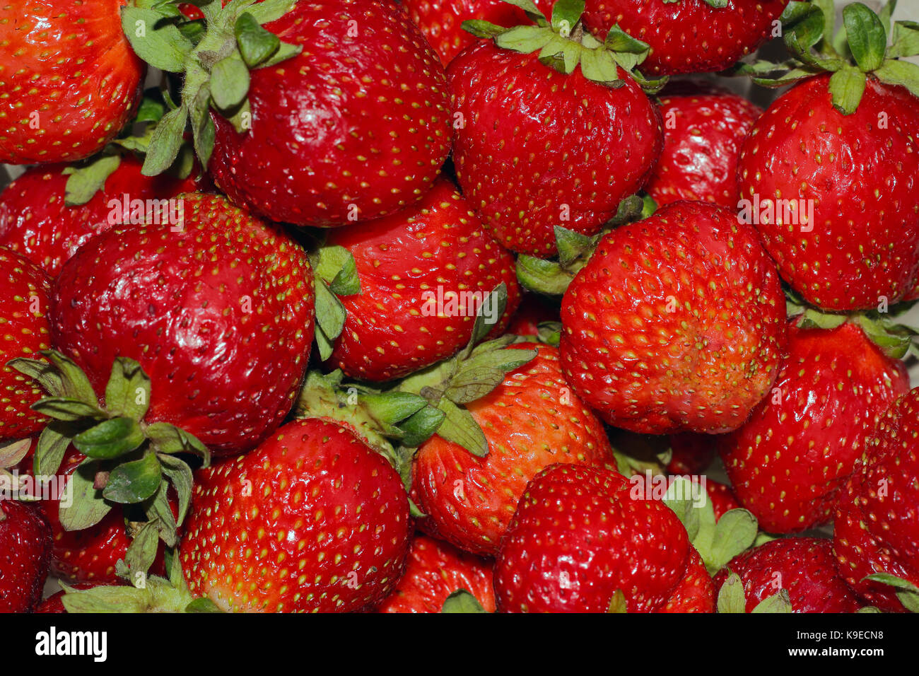 Fresh ripe and juicy strawberry background photo Stock Photo - Alamy