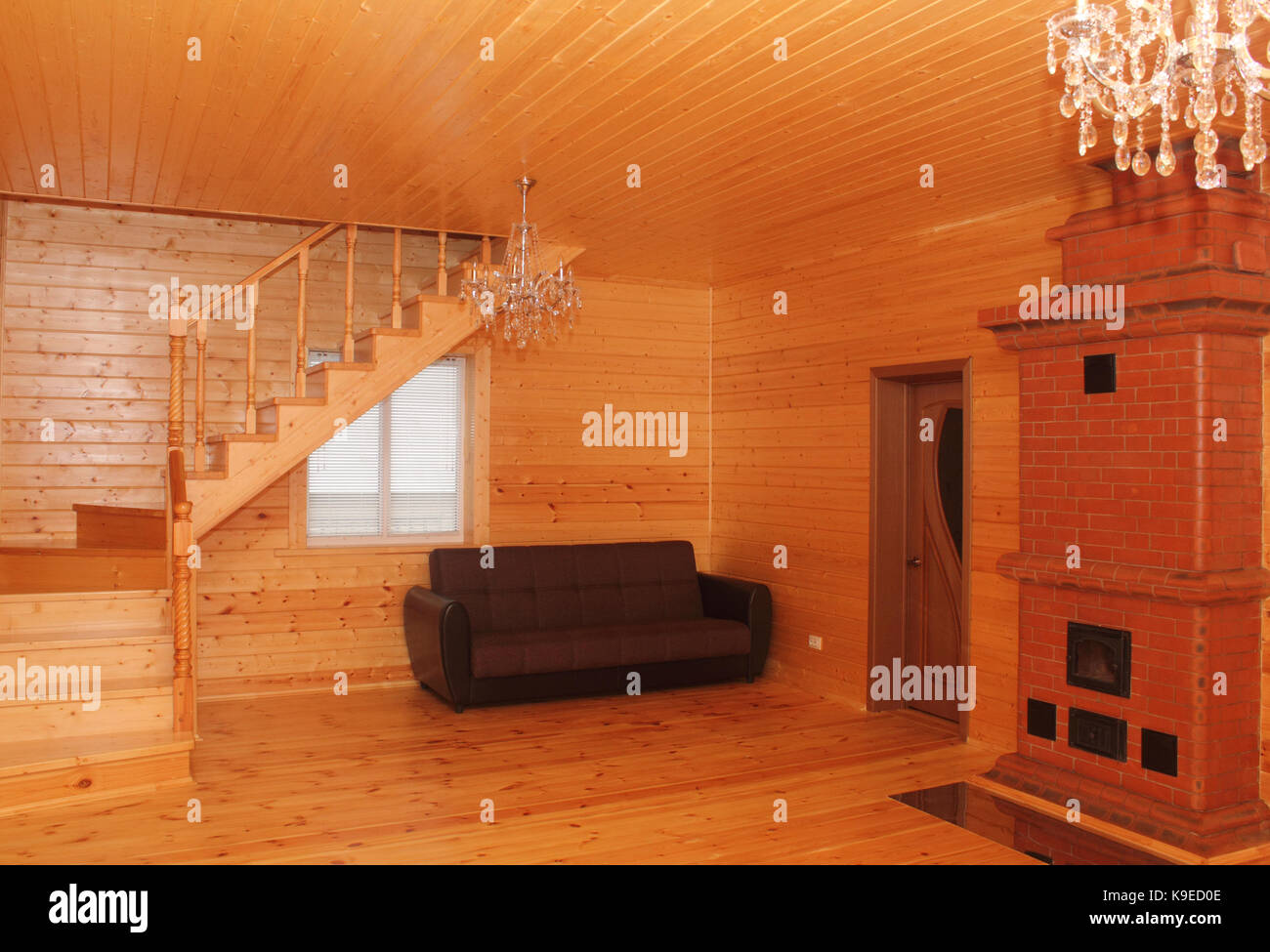 Wooden House Interior With Stairs And Stove Photo Stock Photo