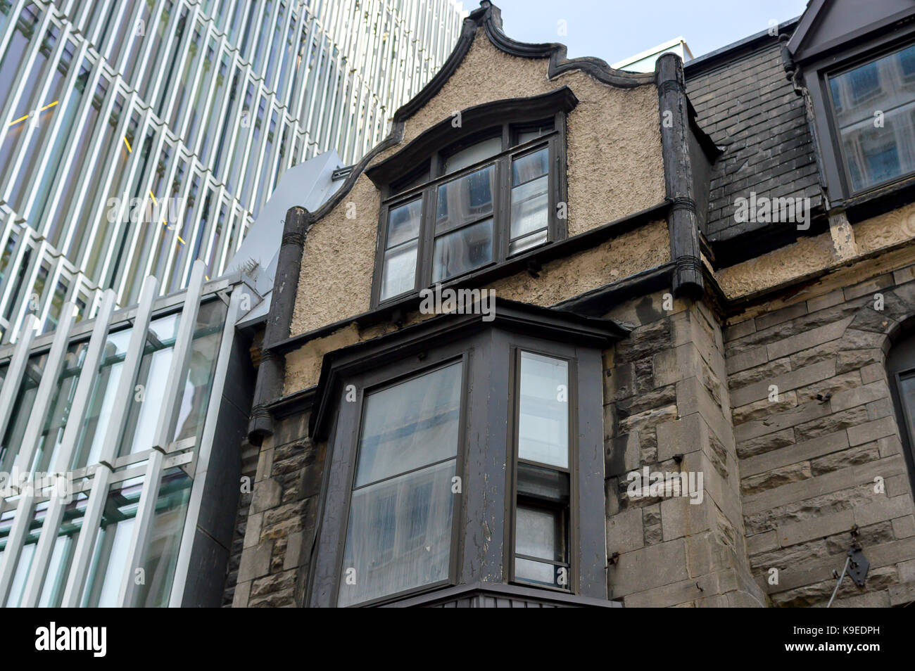 Old and new houses with huge windows in Montreal downtown, Canada Stock
