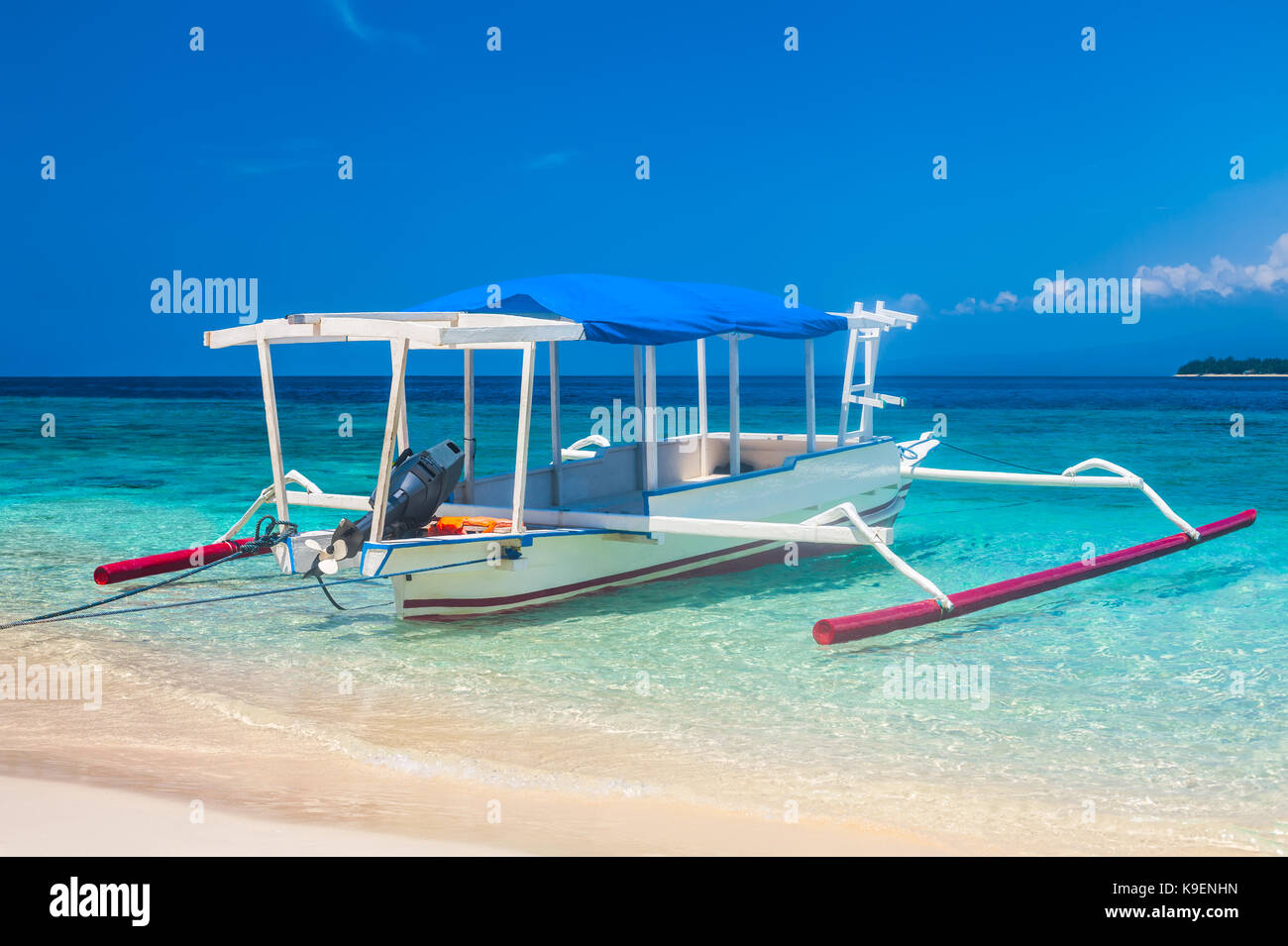 traditional Indonesia boat Jukung on a tropical beah Stock Photo