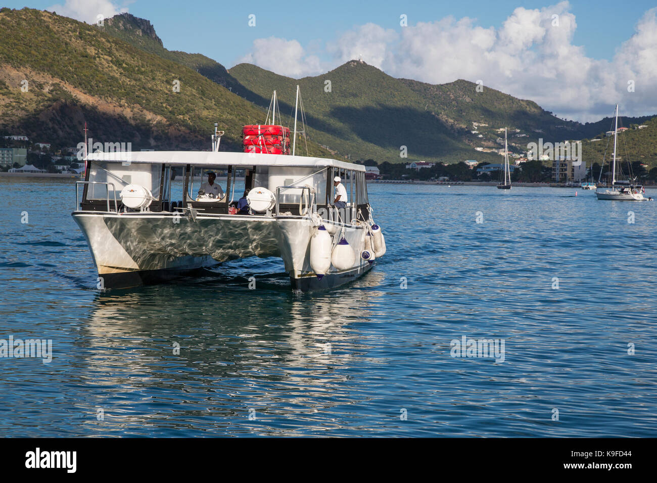 Philipsburg, Sint Maarten. Water Taxi Approching Cruise Liner Stock
