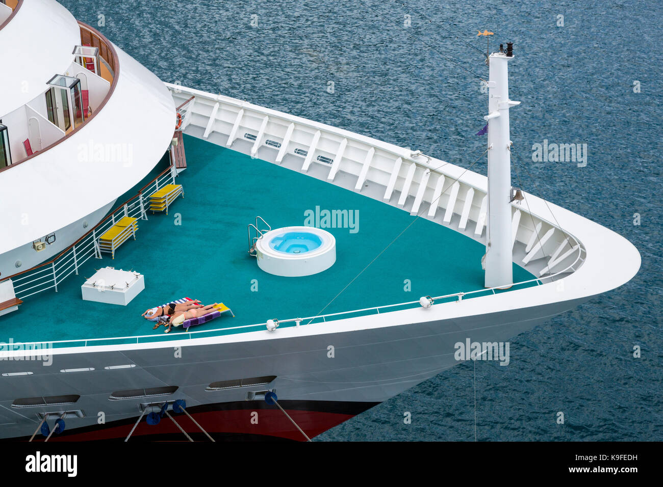 Sunbathers on Deck of  a Cruise Ship. Stock Photo