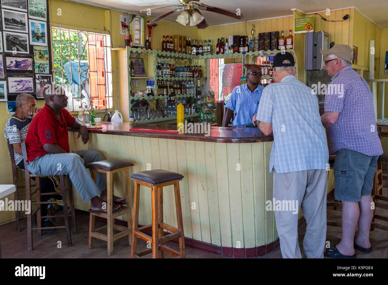 Barbados.  Customers in a Bathsheba Beachside Bar Serving Rum Punch Drinks and Refreshments.   FOR EDITORIAL USE ONLY. Stock Photo