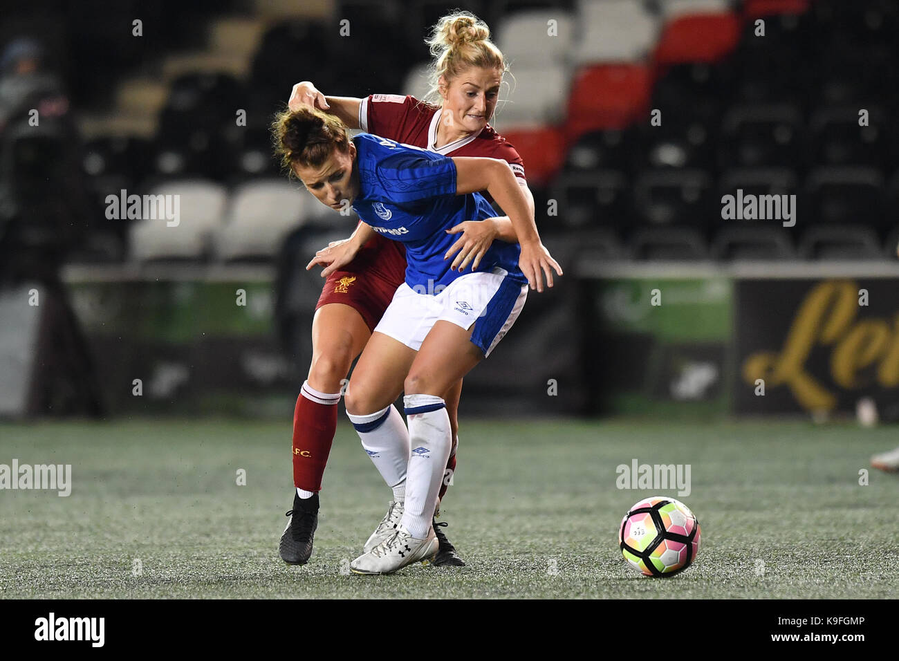 Liverpool's Laura Coombs and Everton's Angharad James compete for possession during the FA Women's Super League match at the Select Security Stadium, Widnes. PRESS ASSOCIATION Photo. Picture date: Friday September 22, 2017. Photo credit should read: Anthony Devlin/PA Wire. RESTRICTIONS: No use with unauthorised audio, video, data, fixture lists, club/league logos or 'live' services. Online in-match use limited to 75 images, no video emulation. No use in betting, games or single club/league/player publications. Stock Photo