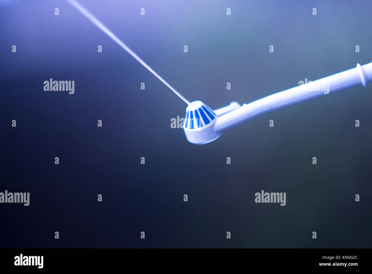 Dental water spray cleaner for interdental hygiene Stock Photo Alamy
