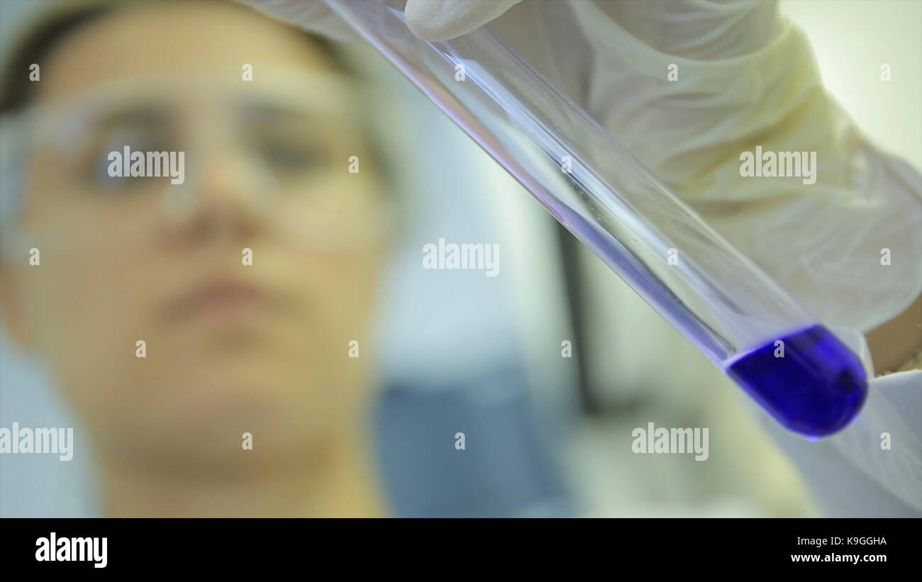 Test tubes closeup. Medical equipment. Closeup footage of a scientist using a micro pipette in
