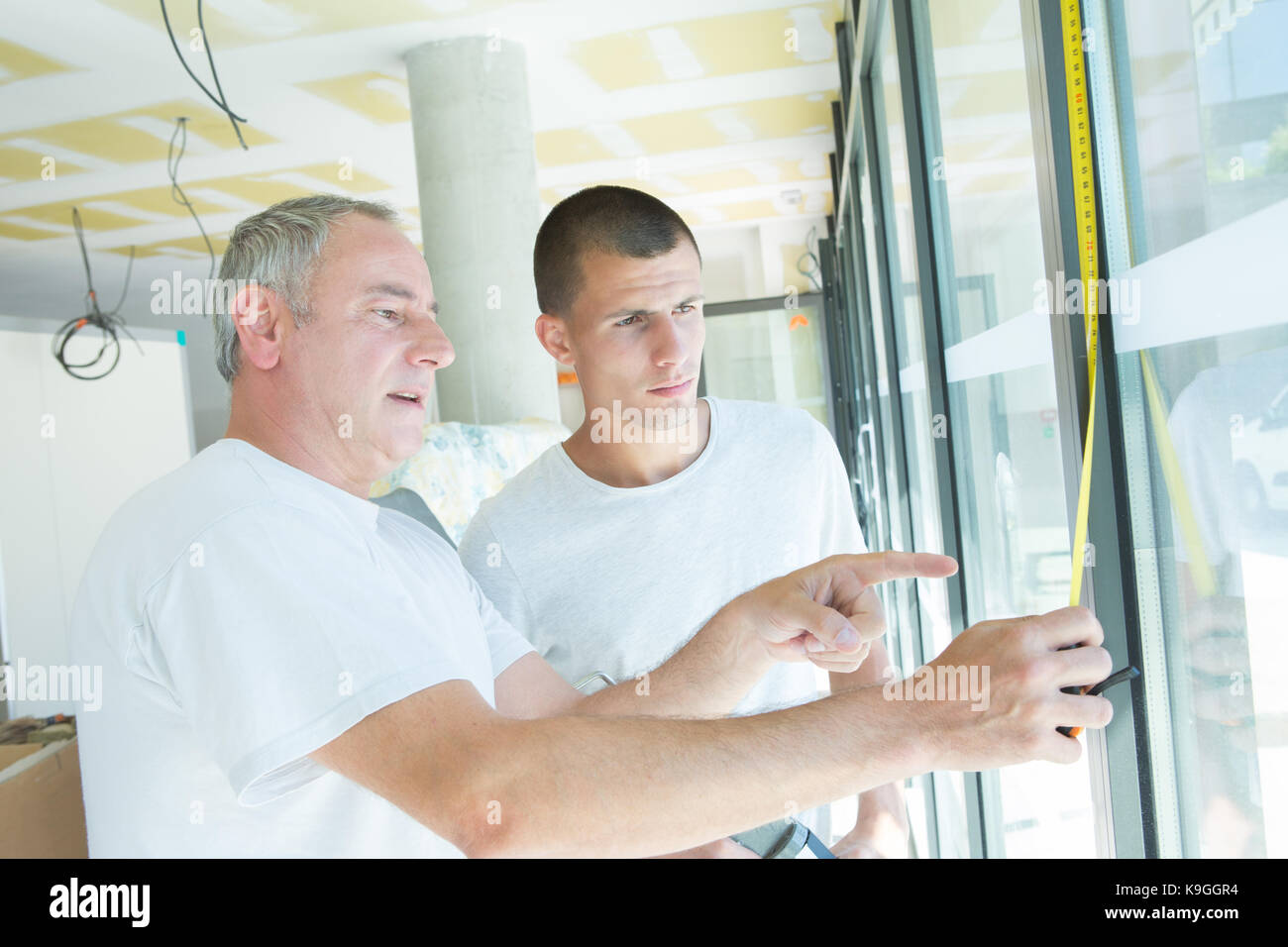 windows installation teacher and apprentice Stock Photo Alamy