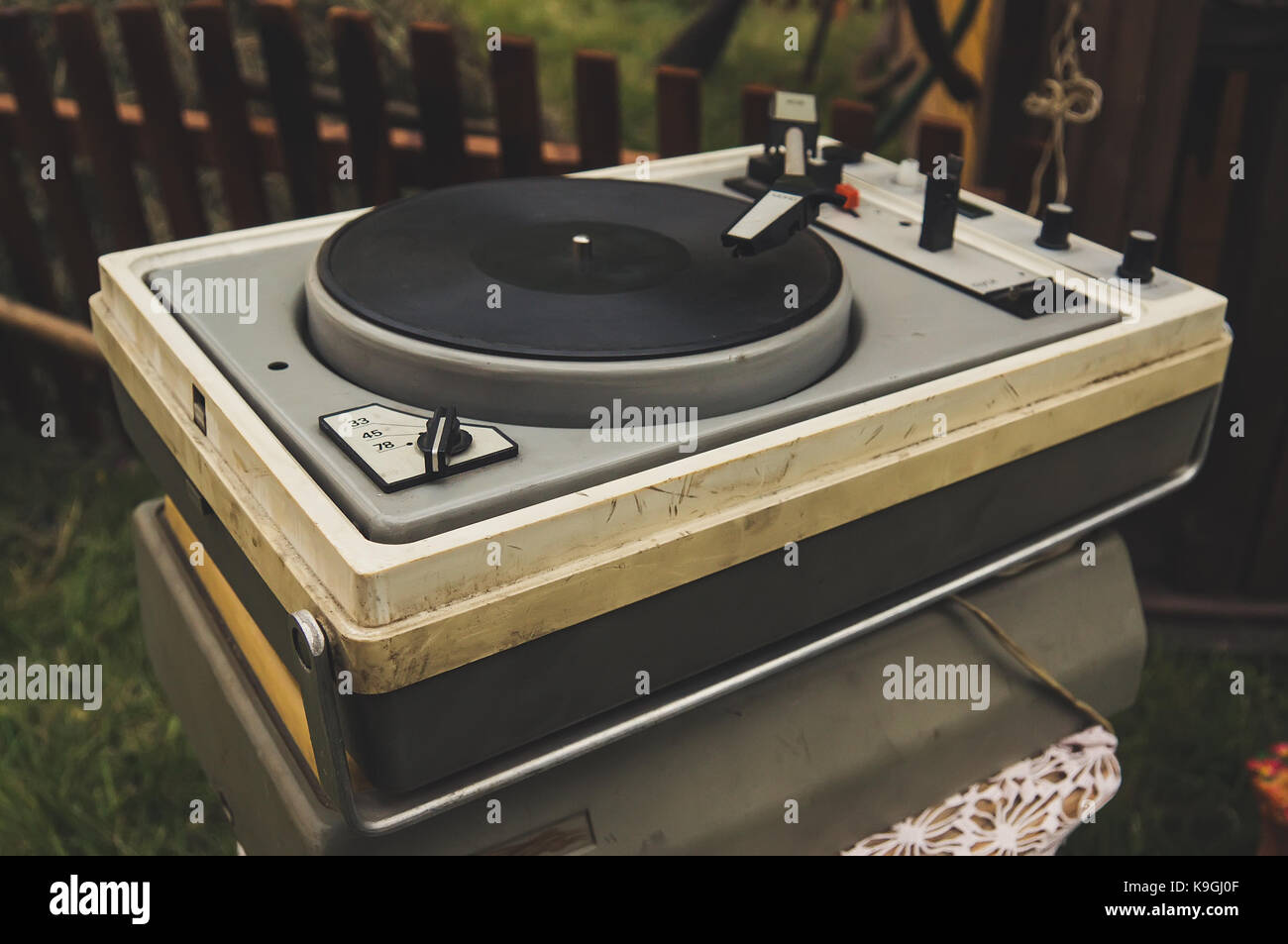 The old Soviet vinyl player. turntable in the Russian village. Rural