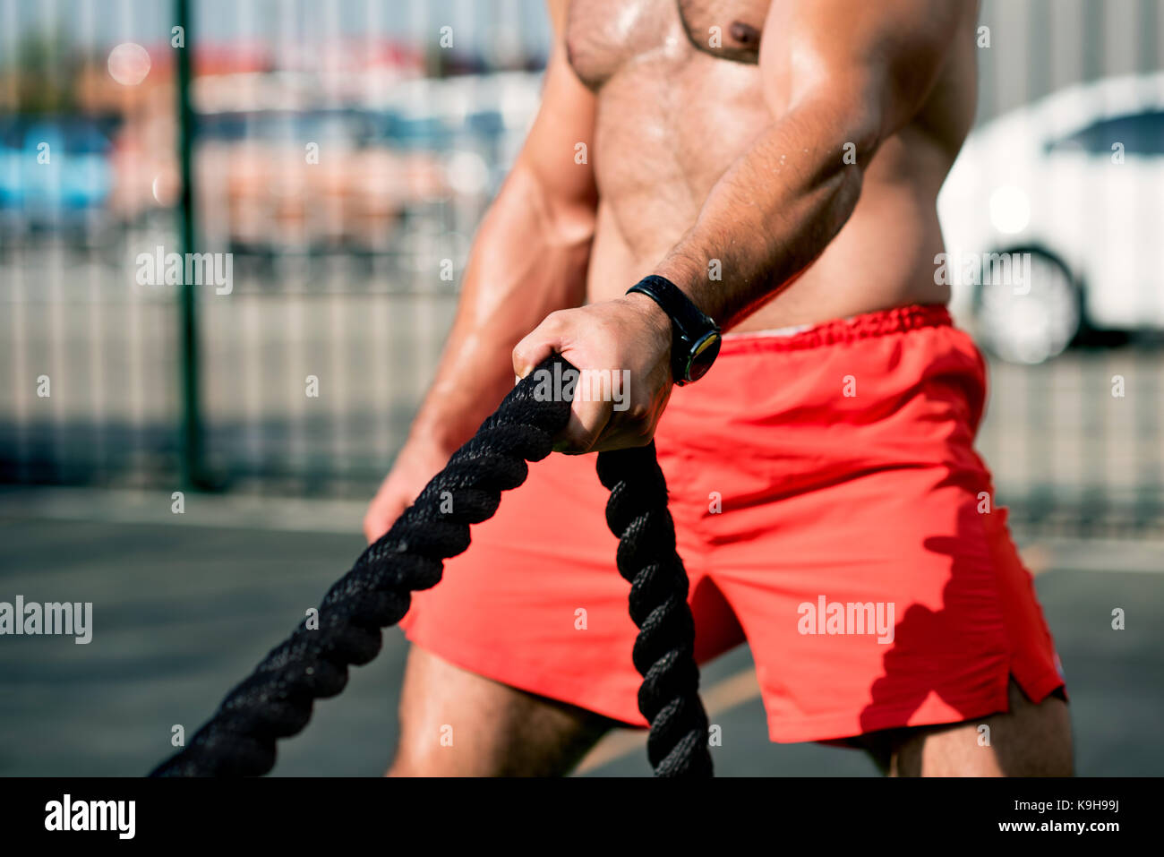 athlete pulls the rope Stock Photo Alamy