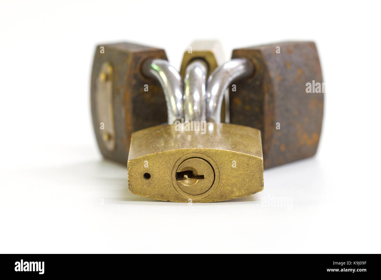 Close up on locked padlock over white background concept Stock Photo ...