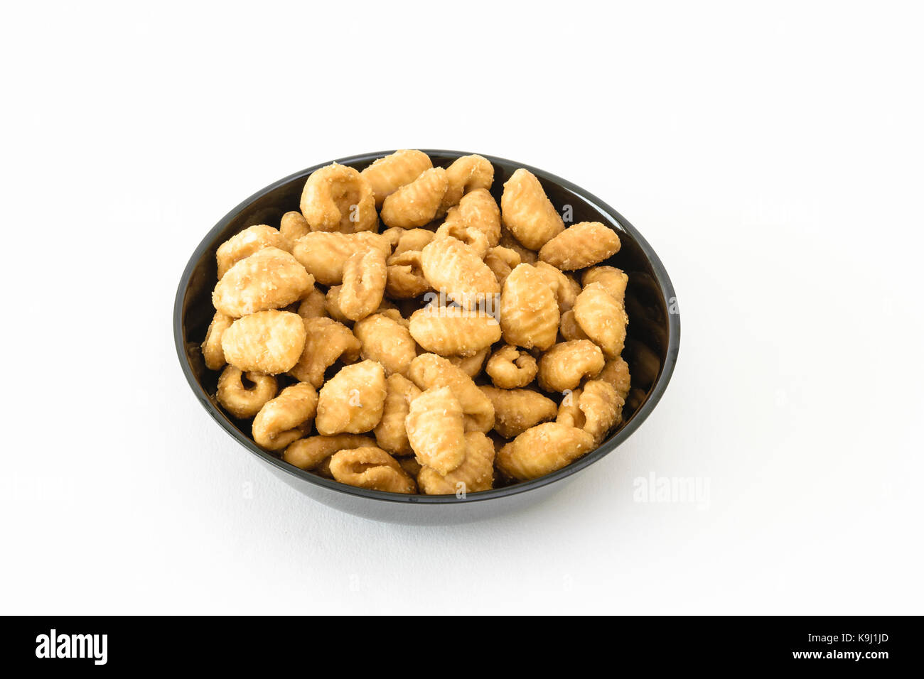 Traditional Indian sweet - Gavvalu or jaggery shells Stock Photo