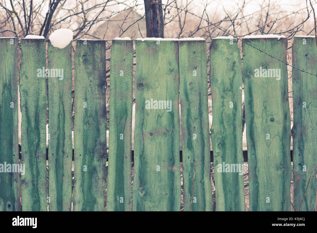 Old green wooden fence on an old pasture Stock Photo - Alamy