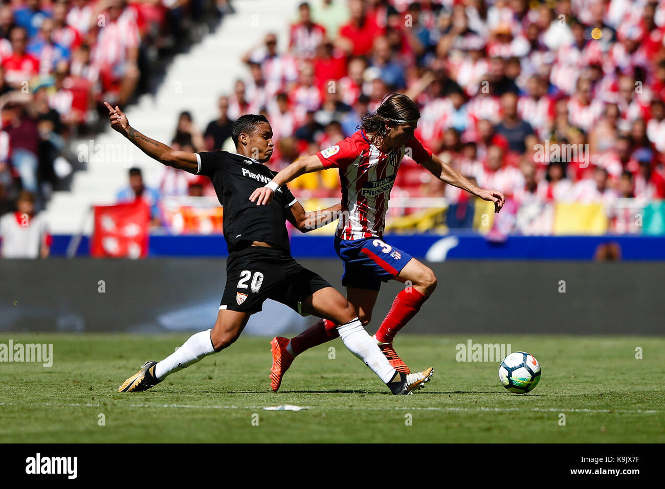 Filipe Luis Kasmirski (3) Atletico de Madrid's player. Luis Muriel (20) Sevilla FC's player. La Liga between Atletico de Madrid vs Sevilla FC at the Wanda Metropolitano stadium in Madrid, Spain, September 23, 2017 . Credit: Gtres Información más Comuniación on line, S.L./Alamy Live News Stock Photo