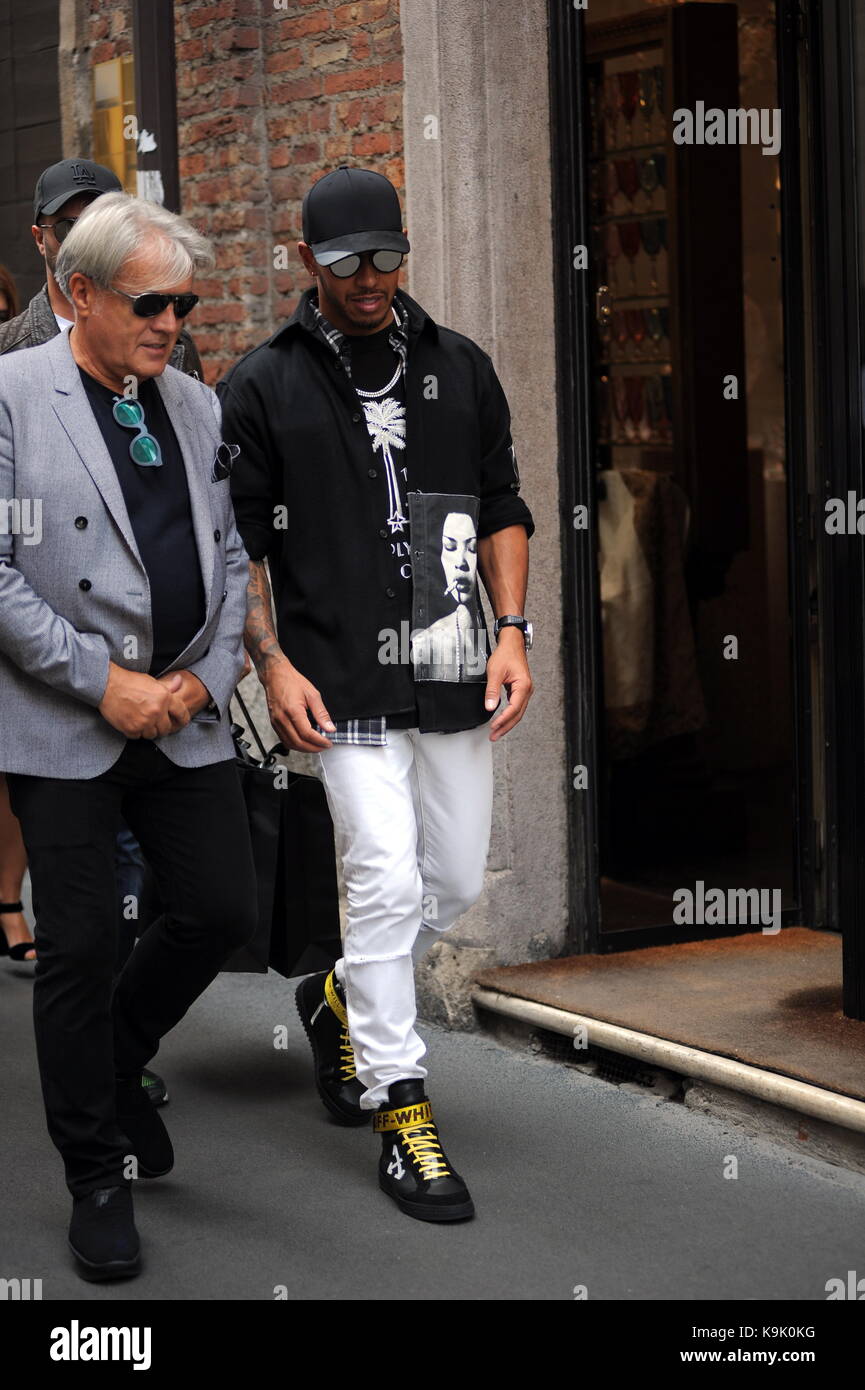 Lewis Hamilton leaves Giuseppe Zanotti's boutique wearing a pair