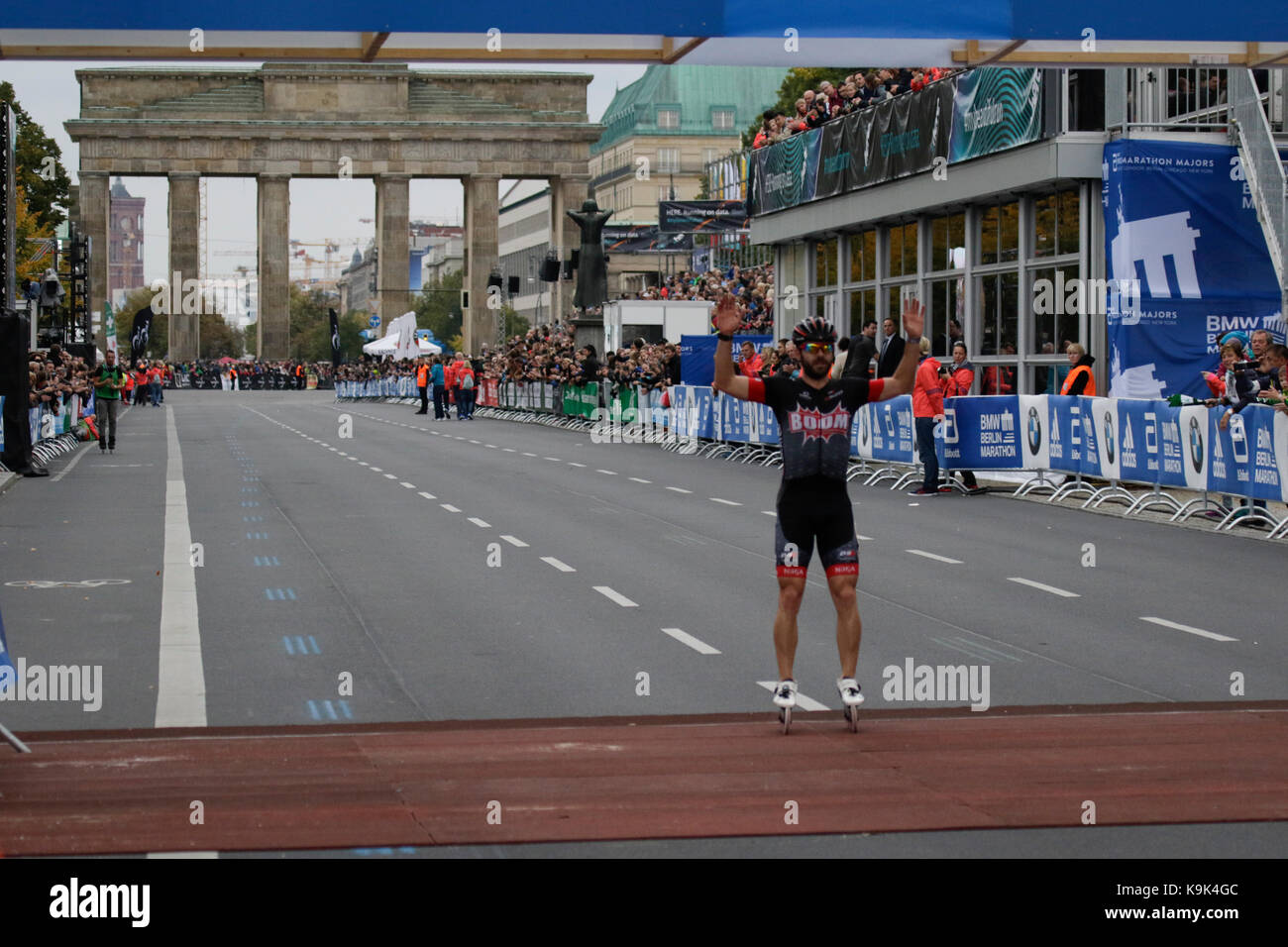 Berlin, Germany. 23rd September 2017. Second place Patxi Peula from Spain crosses the finishing line. Over 5,500 skater took part in the 2017 BMW Berlin Marathon Inline skating race, a day ahead of the Marathon race. Bart Swings from Belgium won the race in 58:42 for the 5th year in a row. Credit: Michael Debets/Alamy Live News Stock Photo