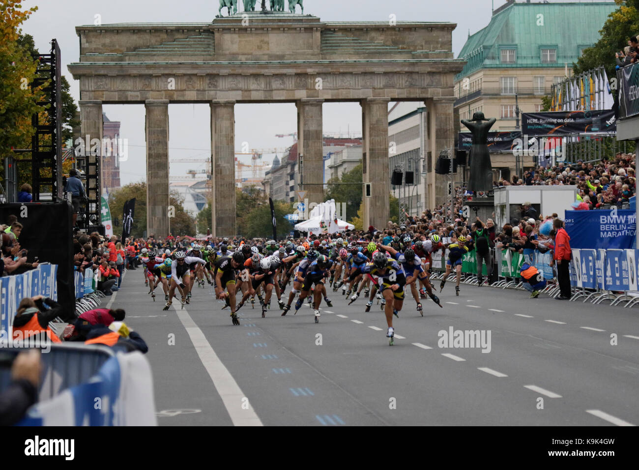 Berlin, Germany. 23rd September 2017. Second place Patxi Peula from Spain crosses the finishing line.Skaters race the last meters of the course from the Brandenburg Gate to the finishing line. Over 5,500 skater took part in the 2017 BMW Berlin Marathon Inline skating race, a day ahead of the Marathon race. Bart Swings from Belgium won the race in 58:42 for the 5th year in a row. Credit: Michael Debets/Alamy Live News Stock Photo