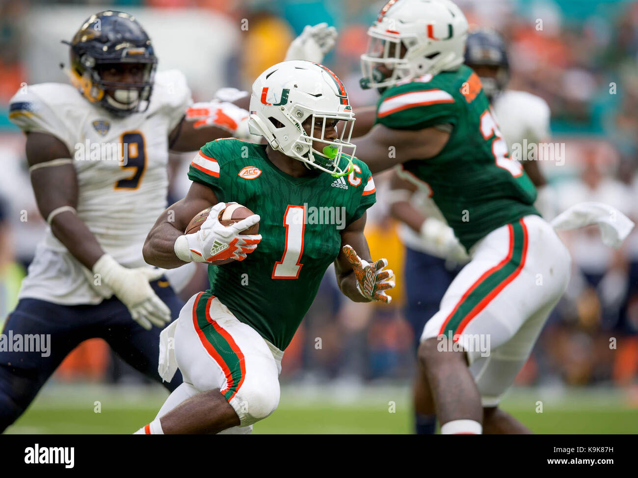 Miami Gardens, Florida, USA. 3rd Sep, 2016. Miami Hurricanes running back Gus  Edwards (7) eludes a tackle attempted by Florida A&M Rattlers linebacker  Adarius Smith (54) at Hard Rock Stadium in Miami