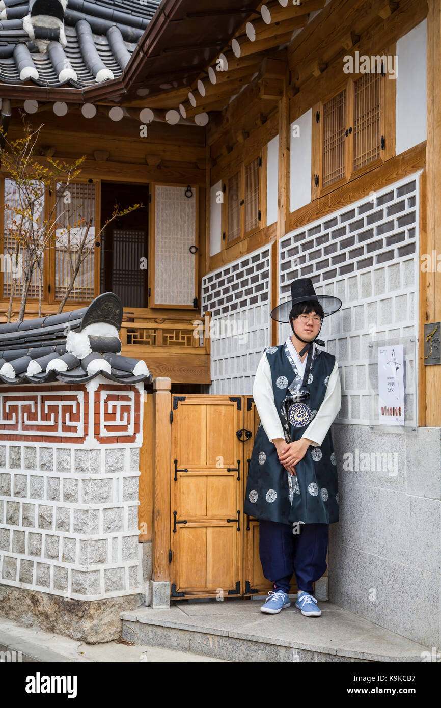 Koreans in traditional dress in Bukchok Hanok Village, Seoul, South Korea, Asia. Stock Photo