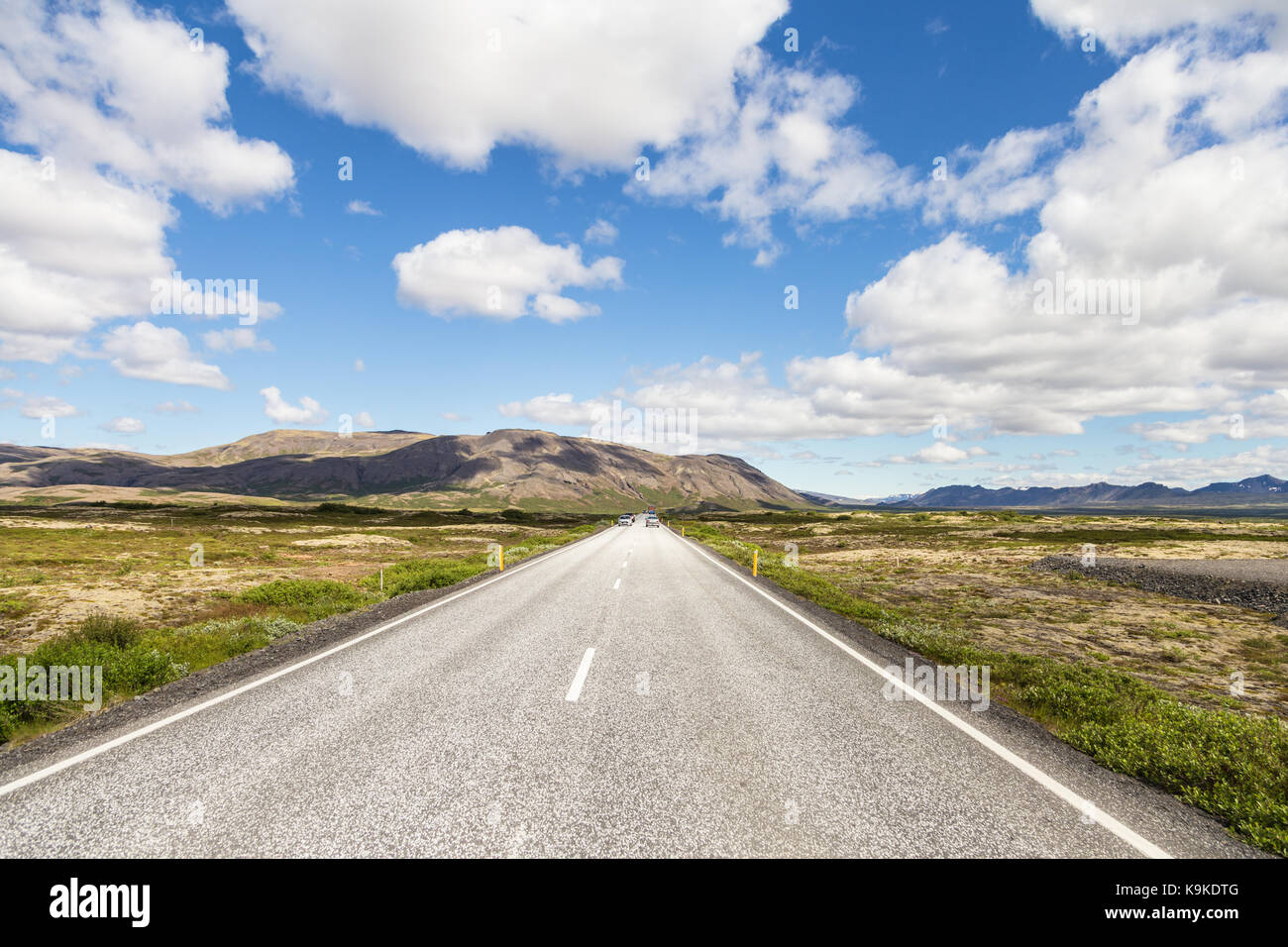 On  the road in Iceland along the Golden Circle encompassing various famous natural attractions on a day trip from Reykjavik. Stock Photo