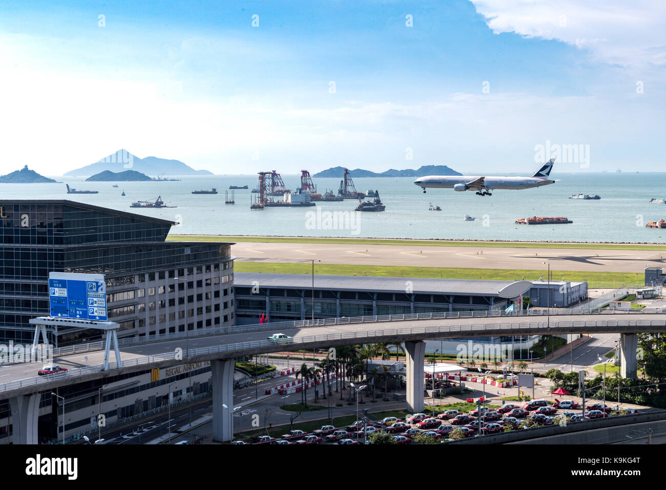 Lantau, Hong Kong  - September 10, 2017 :  Airplane landing at Hong Kong International Airport Stock Photo