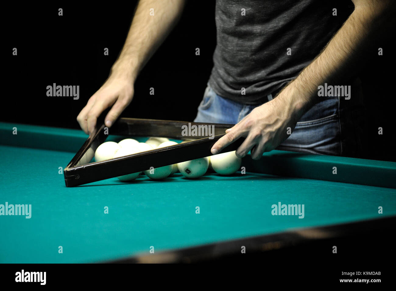 Billiard. Setting up the balls for the beginning of game Stock Photo
