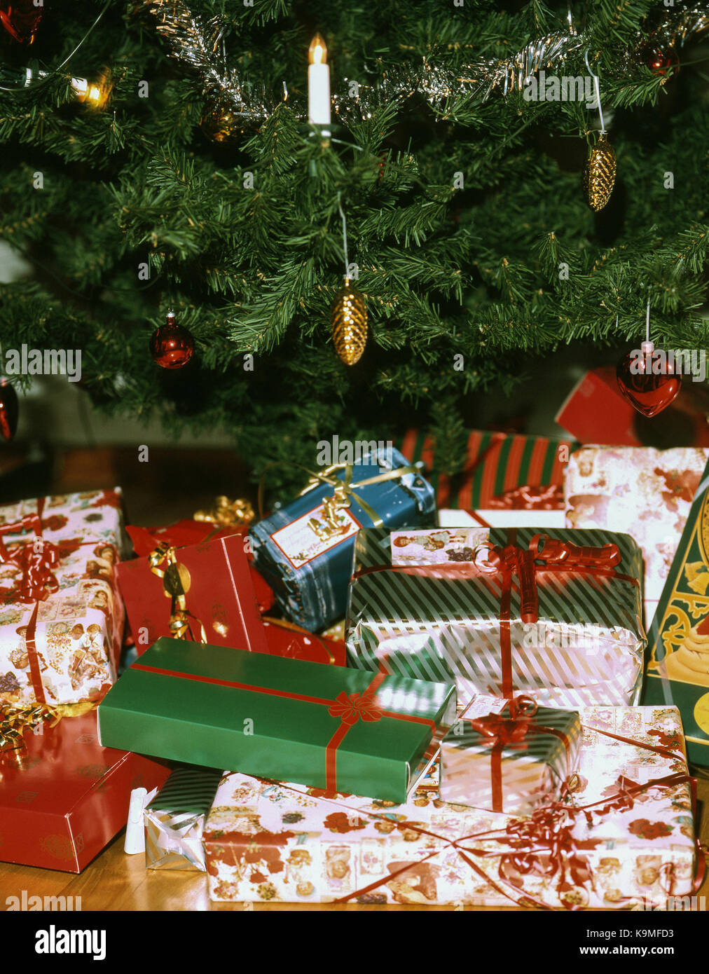 CHRISTMAS PACKAGE under the Christmas tree 2015 Stock Photo