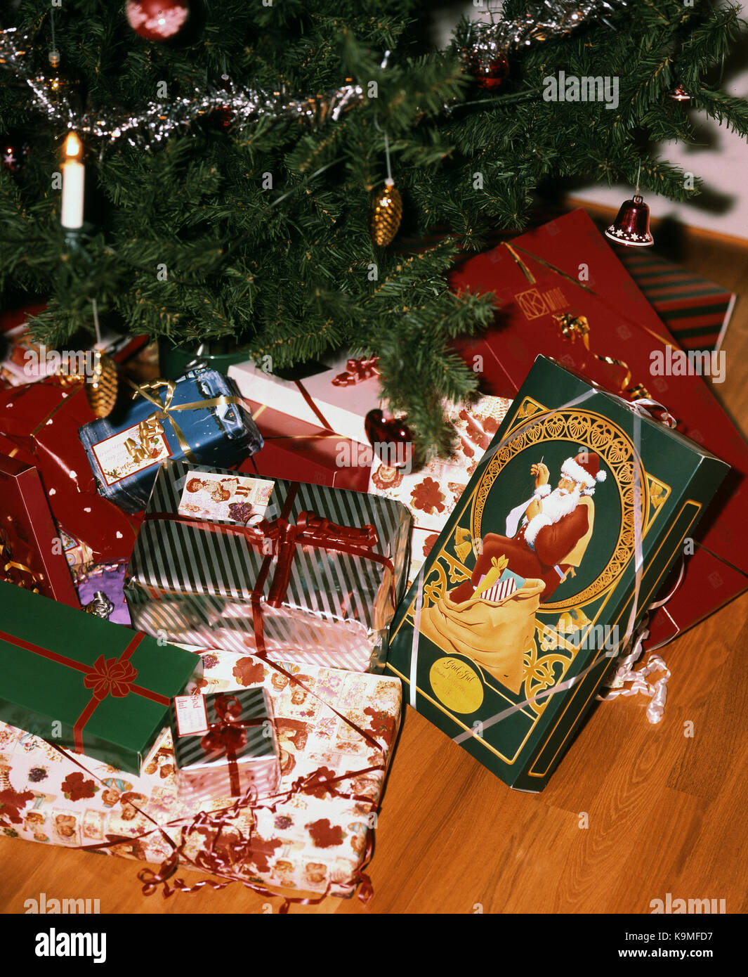 CHRISTMAS PACKAGE under the Christmas tree 2015 Stock Photo