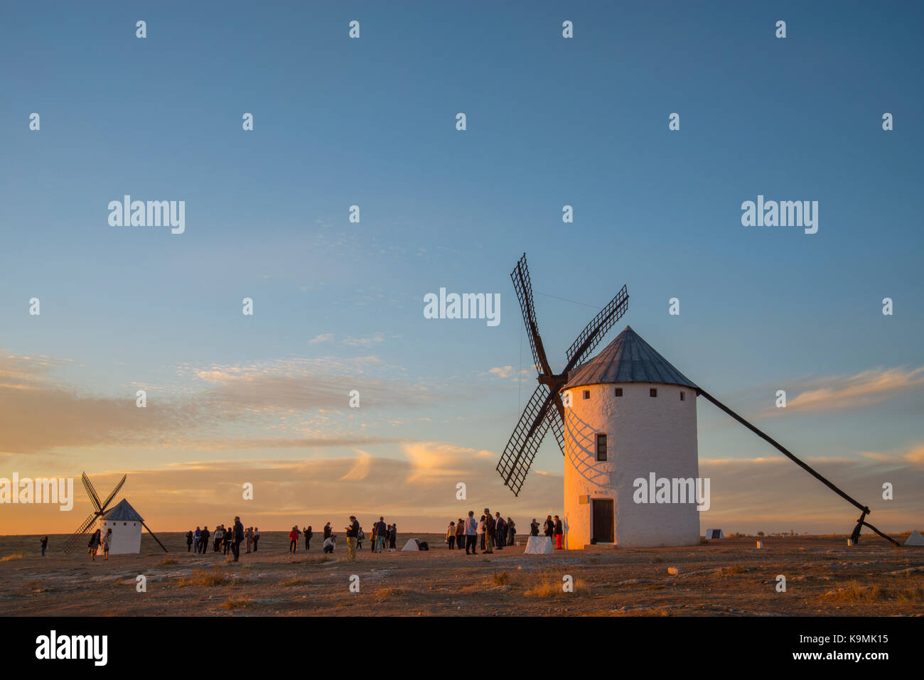 Windmills at dusk. Campo de Criptana, Ciudad Real province, Castilla La Mancha, Spain. Stock Photo