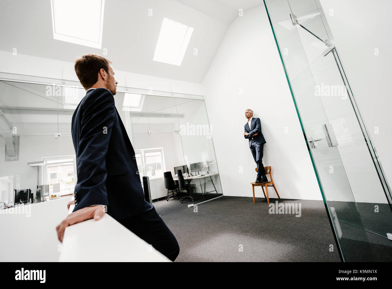 Two businessmen in office Stock Photo - Alamy