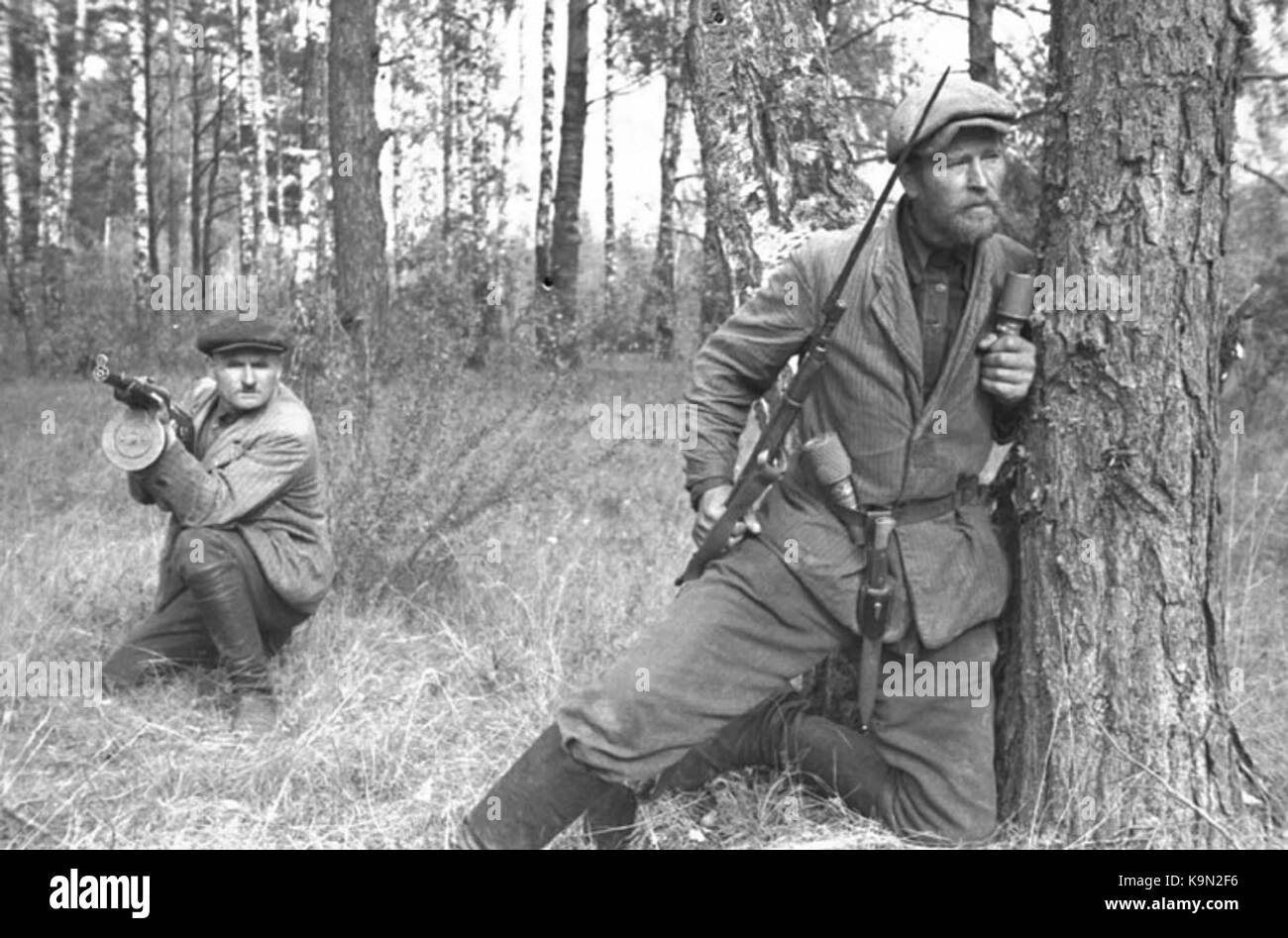 Soviet partisan fighters behind German front lines in Belarus in 1943 Stock Photo