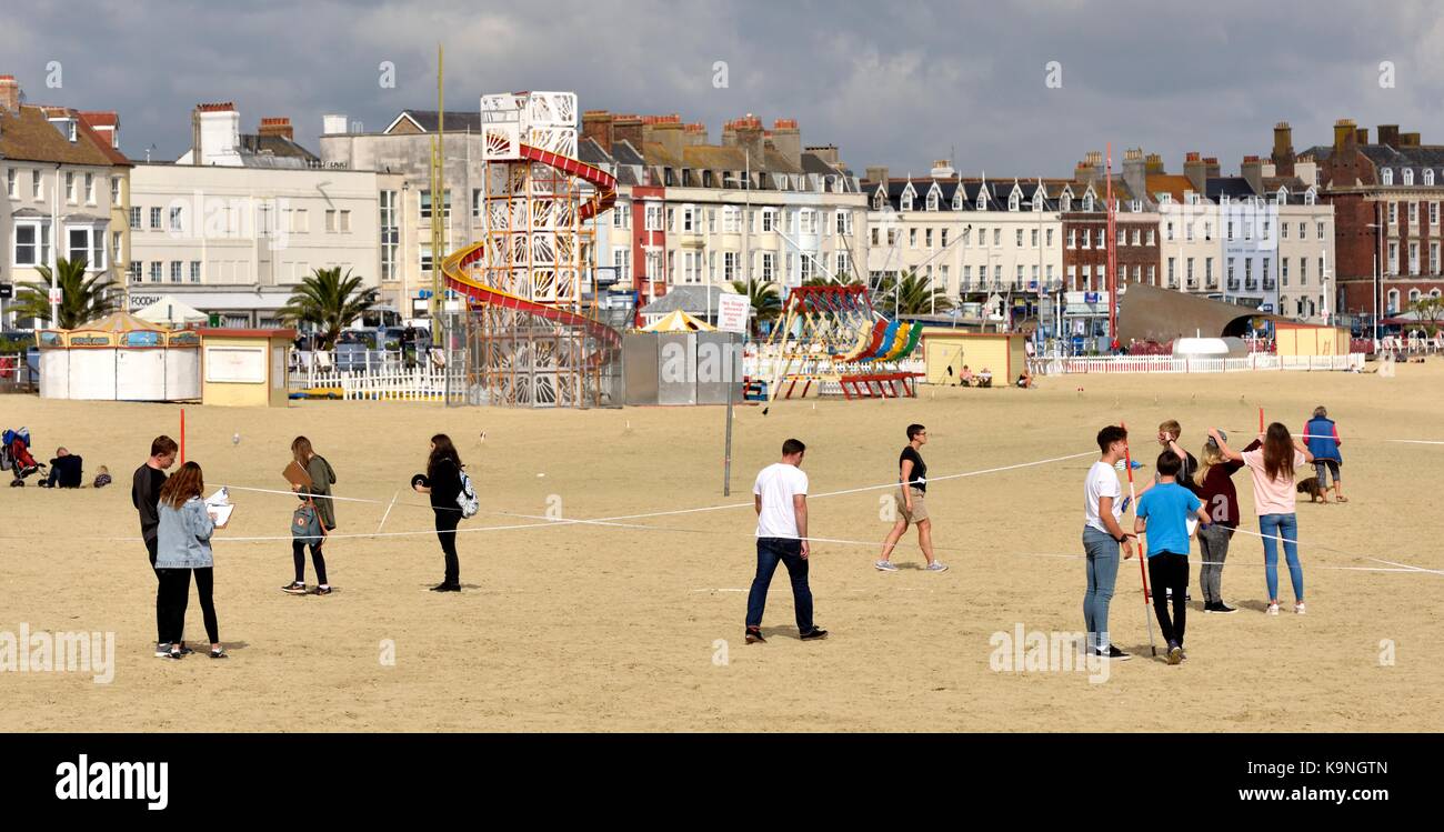 Students surveying Weymouth beach Dorset England UK Stock Photo Alamy