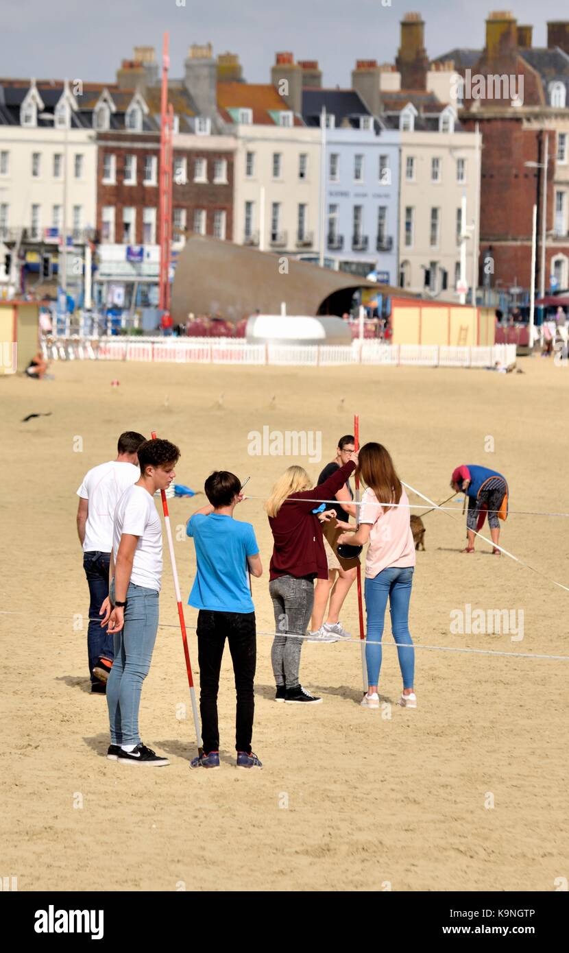 Students surveying Weymouth beach Dorset England UK Stock Photo Alamy