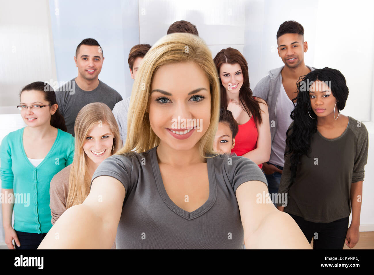 Group Of Young Happy Friends Taking Selfie Stock Photo - Alamy