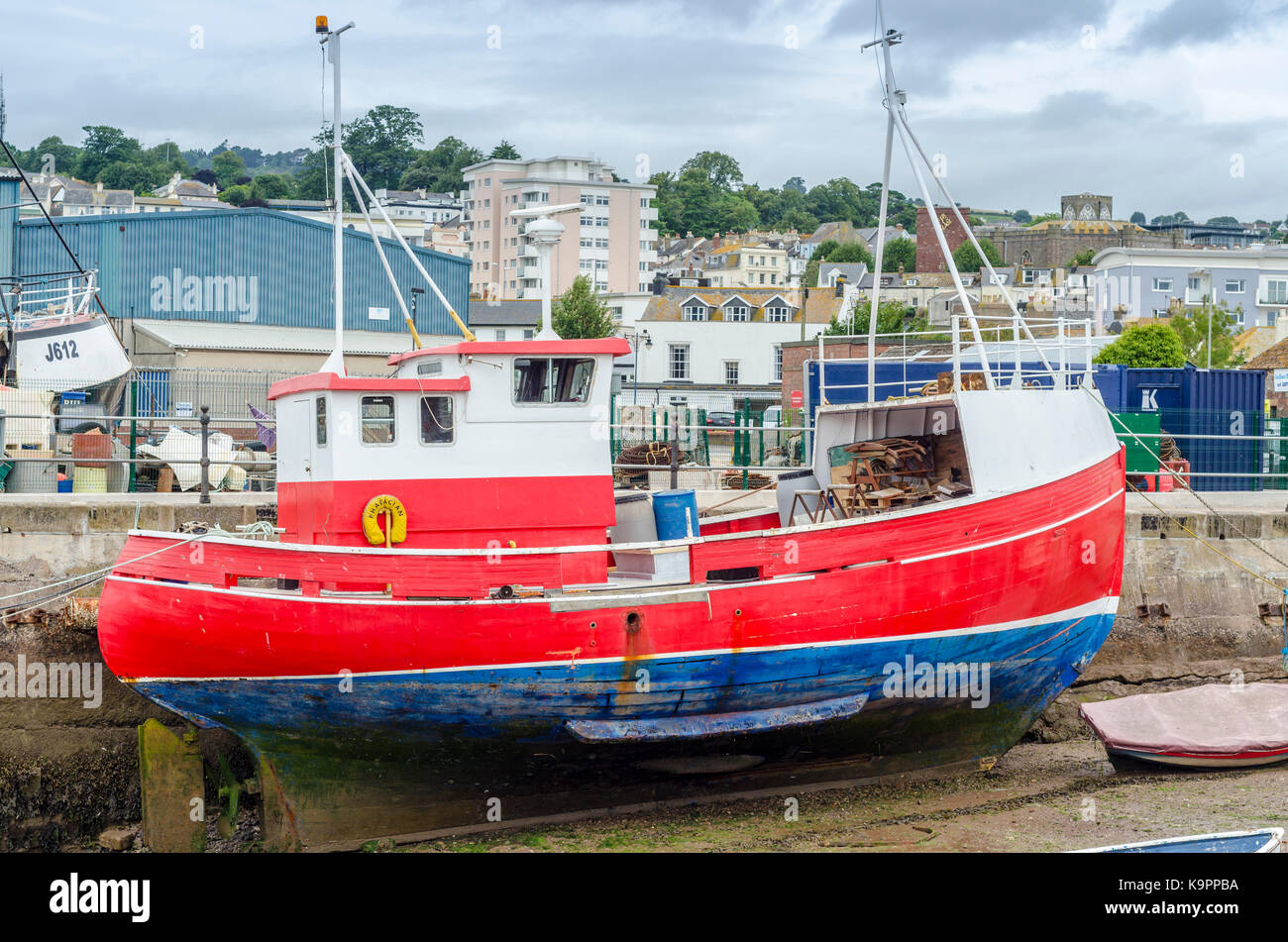 Boat in a dry harbour dry dock, Teignmouth, Devon, England, UK Stock Photo