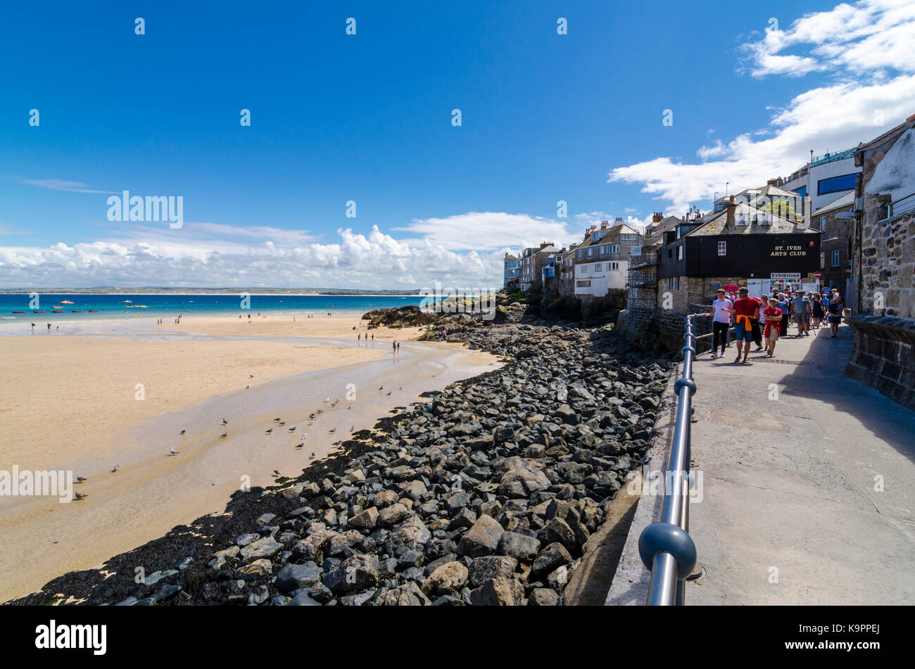 People walking along Pendola Walk coastal path in St Ives near Porthminster Beach. Cornwall, England, UK Stock Photo