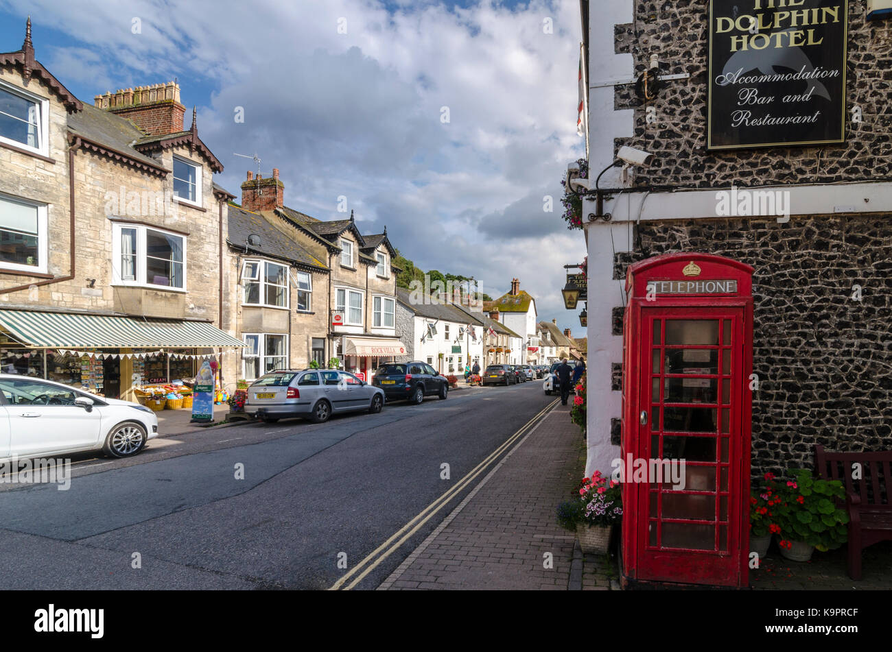 Telephone box on Fore Street, Beer, English Seaside Coastal town, East Devon Coast, England, UK Stock Photo