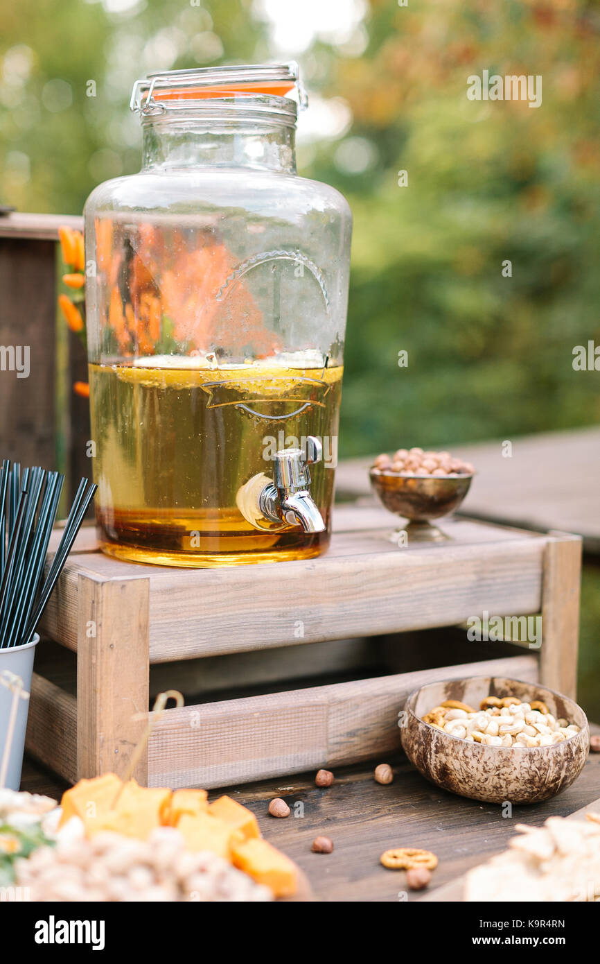 food, refreshment, drinks concept. in the big transparent glass jar