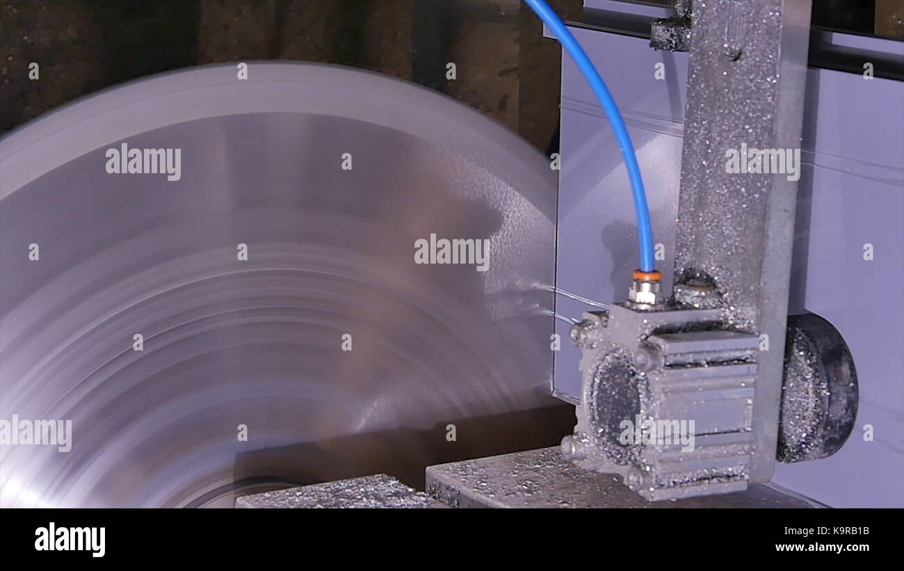 Circular saw for cutting aluminum. Sawing metal. Circular saw cutting