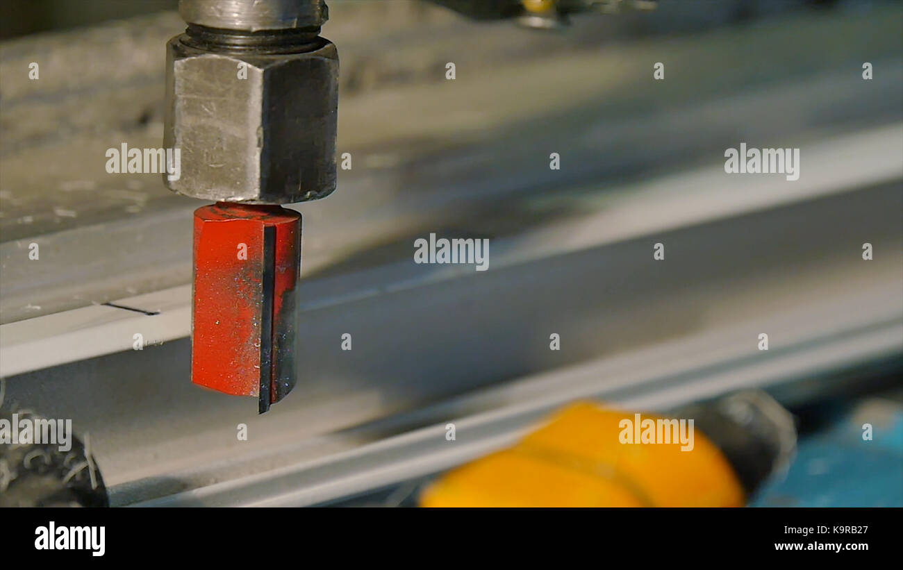 Drill with diamondtipped polishing metal parts. Hole being drilled