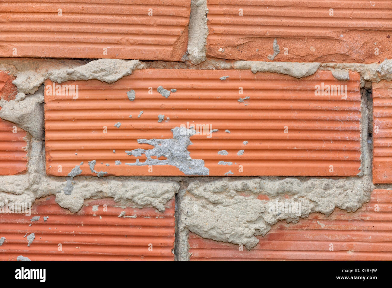 Wall texture of baked clay bricks. Stock Photo