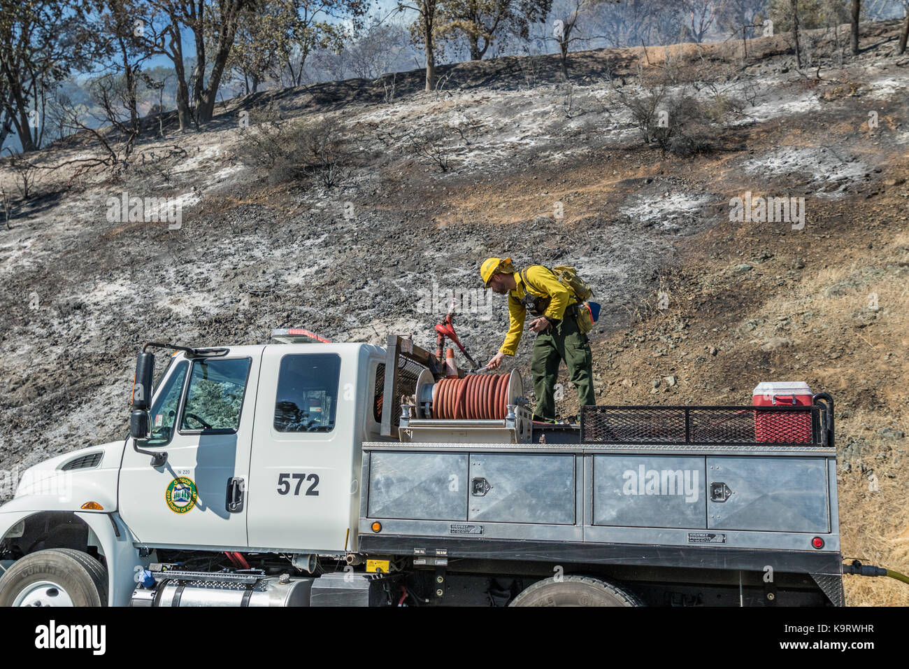 Firefighter in Medford OR battling wildfire Stock Photo