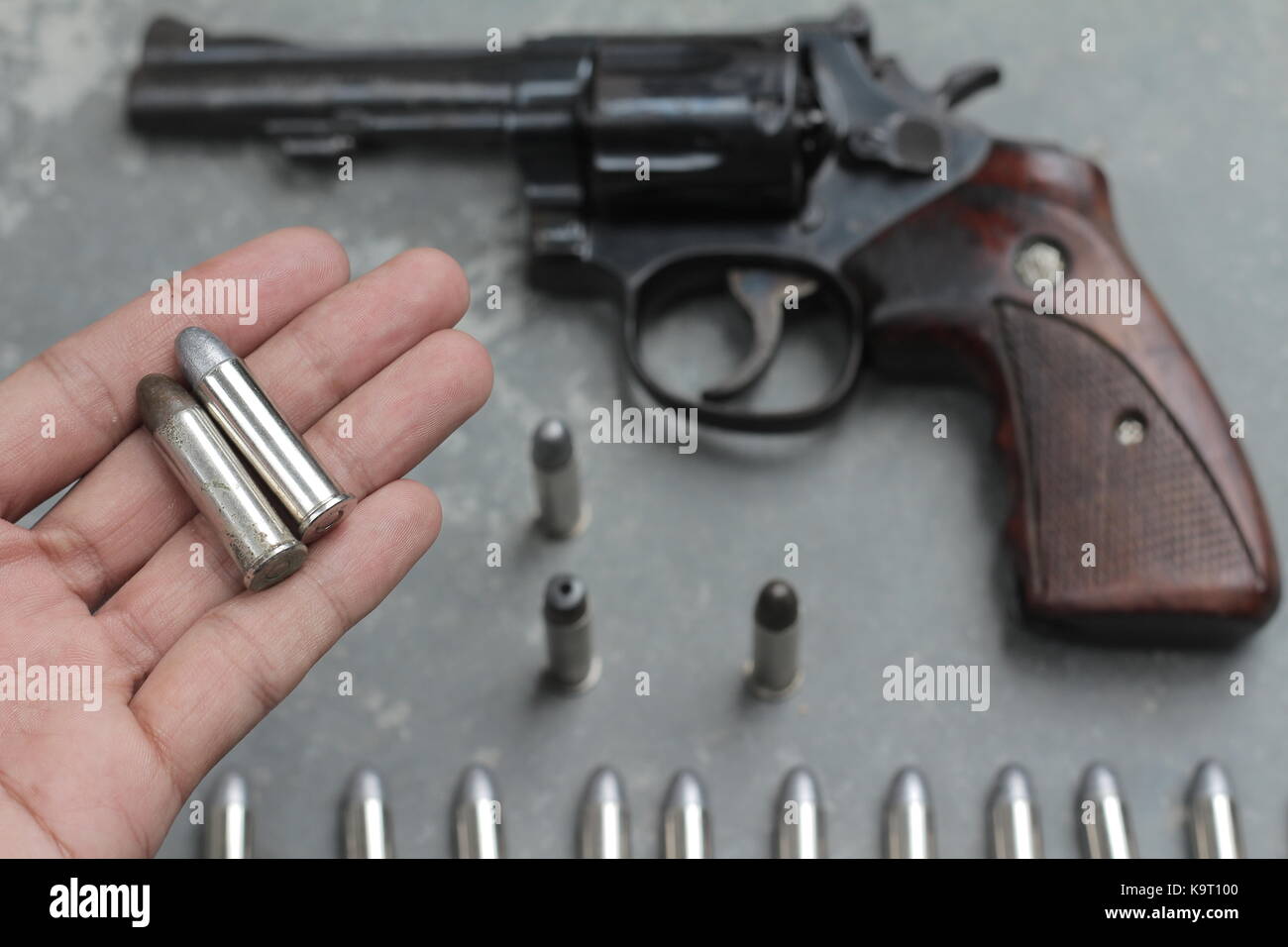 bullet and gun revolver Stock Photo - Alamy