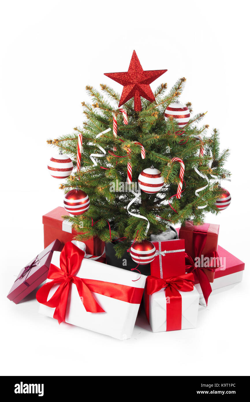 Decorated christmas tree and gifts isolated on white background Stock ...