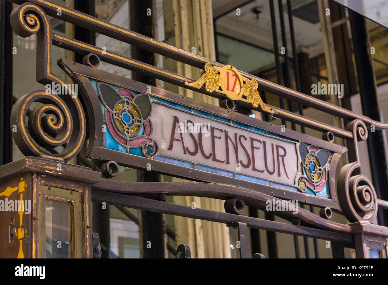 Art Nouveau lift sign in Galeries Lafayette department store, Paris