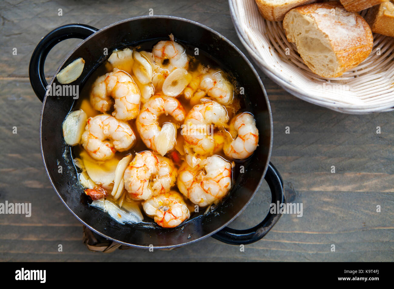 Traditional Spanish tapas of garlic prawns Stock Photo - Alamy