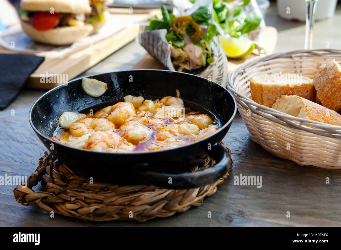 Traditional Spanish tapas of garlic prawns Stock Photo - Alamy