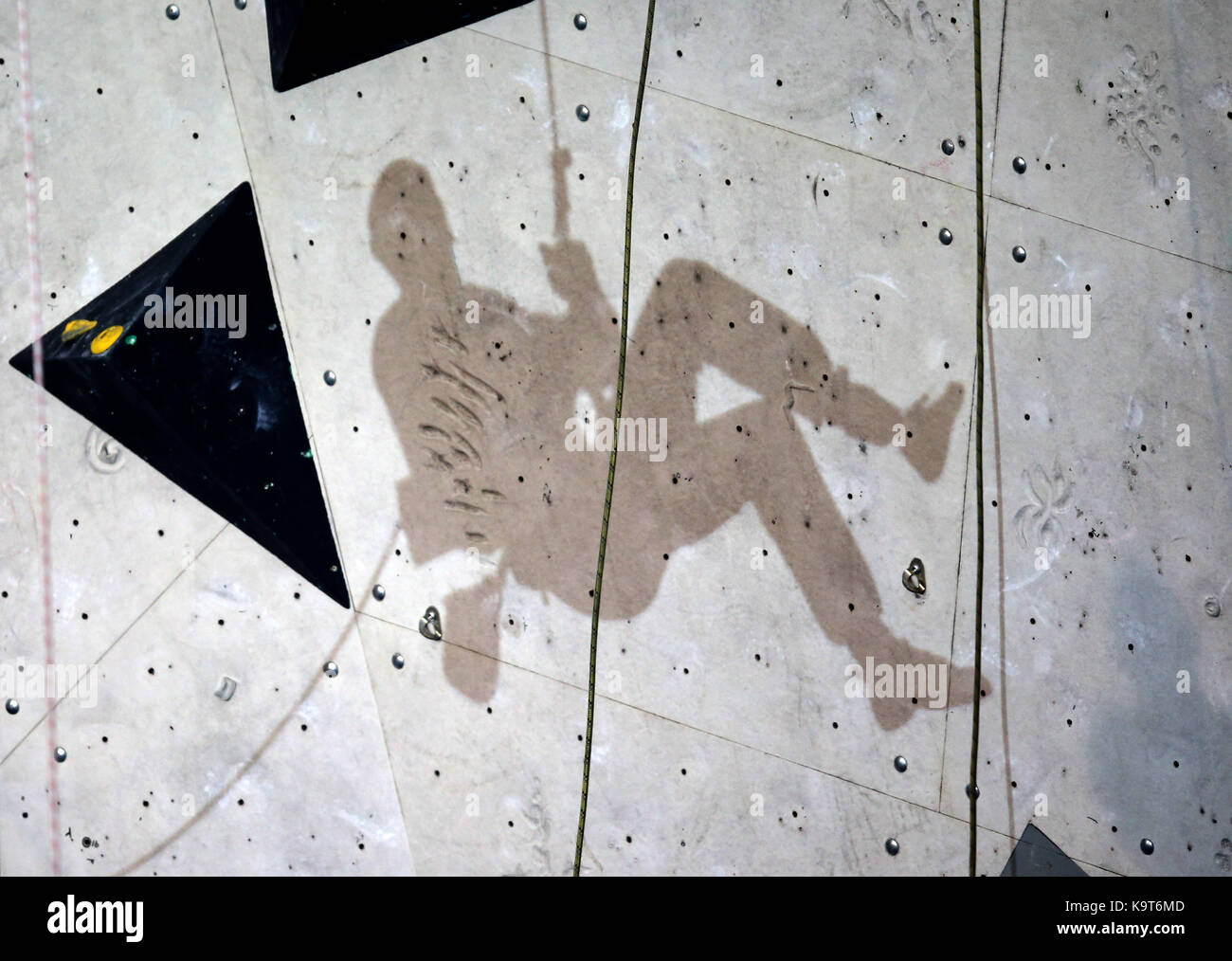 Shadow of France's Julien Gasc in the final of the Mens AL-2 (amputation lower) climb during the IFSC Climbing World Cup at the Edinburgh International Climbing Arena. PRESS ASSOCIATION Photo. Picture date: Sunday September 24, 2017. Photo credit should read: Jane Barlow/PA Wire. RESTRICTIONS: EDITORIAL USE ONLY Stock Photo