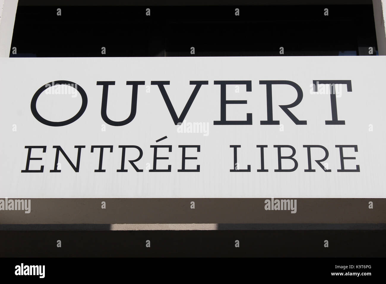 Outdoor Open Sign With Written In It In French Ouvert, Bienvenue Meaning  In English Open, Welcome. Stock Photo, Picture and Royalty Free Image.  Image 151867173.