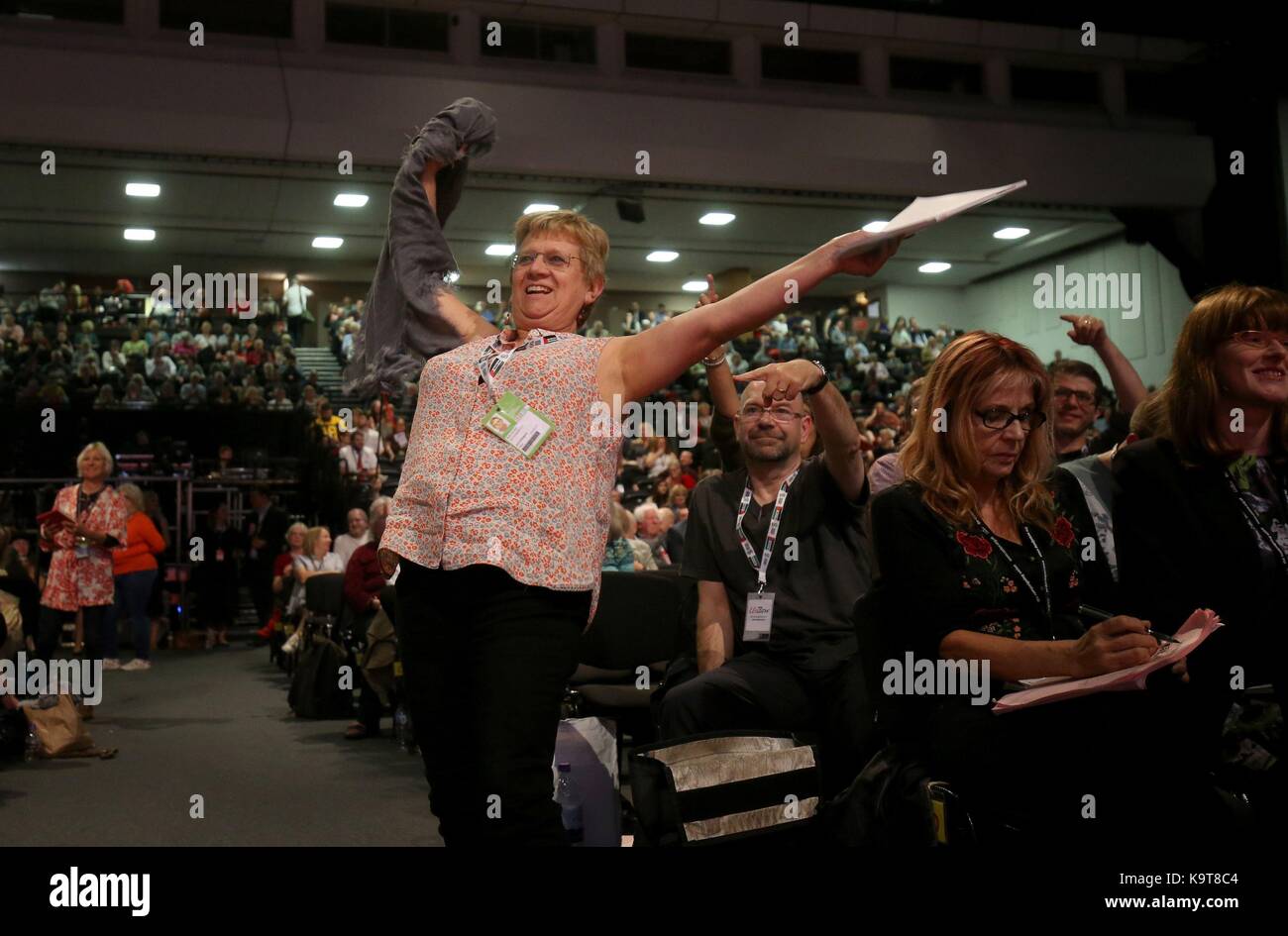 A delegate volunteers to speak during the Labour Party conference in Brighton. Stock Photo